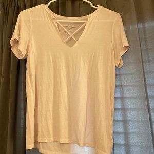 baby pink t shirt with cross v neck
